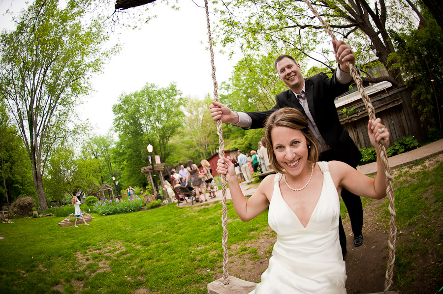 story-inn-wedding-brooke-hank-14 cute bride and groom on a swing at wedding