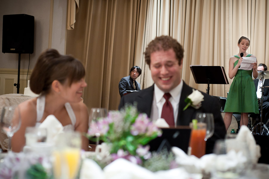 boston-church-advent-sheraton-commander-wedding-photography-16 funny moment of bride and groom laughing during toast