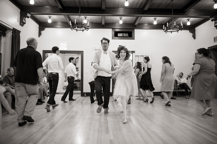 Bride and Groom square dancing at wedding