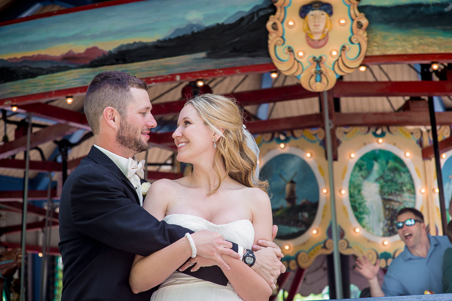 Mill-Top-Noblesville-Fishers-Indianapolis-Wedding-Photography-Holly-Brian-07 Funny passerby on carousel during wedding portrait