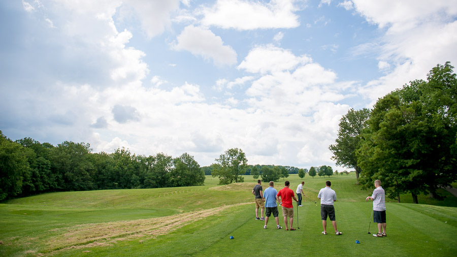 The-Fields-Wedding-Photography-Bloomington-Indiana-Erin-Jim-01 Groomsmen golfing at the IU golf course pre-wedding.