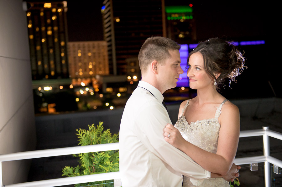 Muhammad-Ali-Center-Wedding-Photography-Louisville-Kentucky-Megan-Ryan-14 Nighttime wedding portrait on Ali Center balcony in Louisville