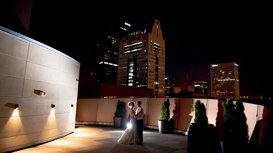 Muhammad-Ali-Center-Wedding-Photography-Louisville-Kentucky-Megan-Ryan-16 balcony wedding portrait with louisville cityscape