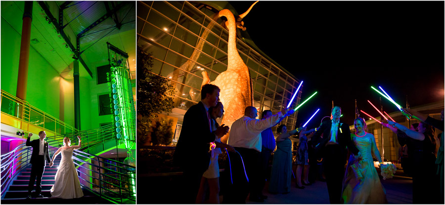 Indianapolis-Childrens-Museum-Wedding-Photography-Rebecca-Nathan-21 Fun lightsaber wedding exit at Indianapolis Children's Museum with a dinosaur behind!