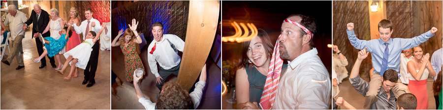 photography of wacky, fun, and zany dance moves at Indiana orchard barn wedding