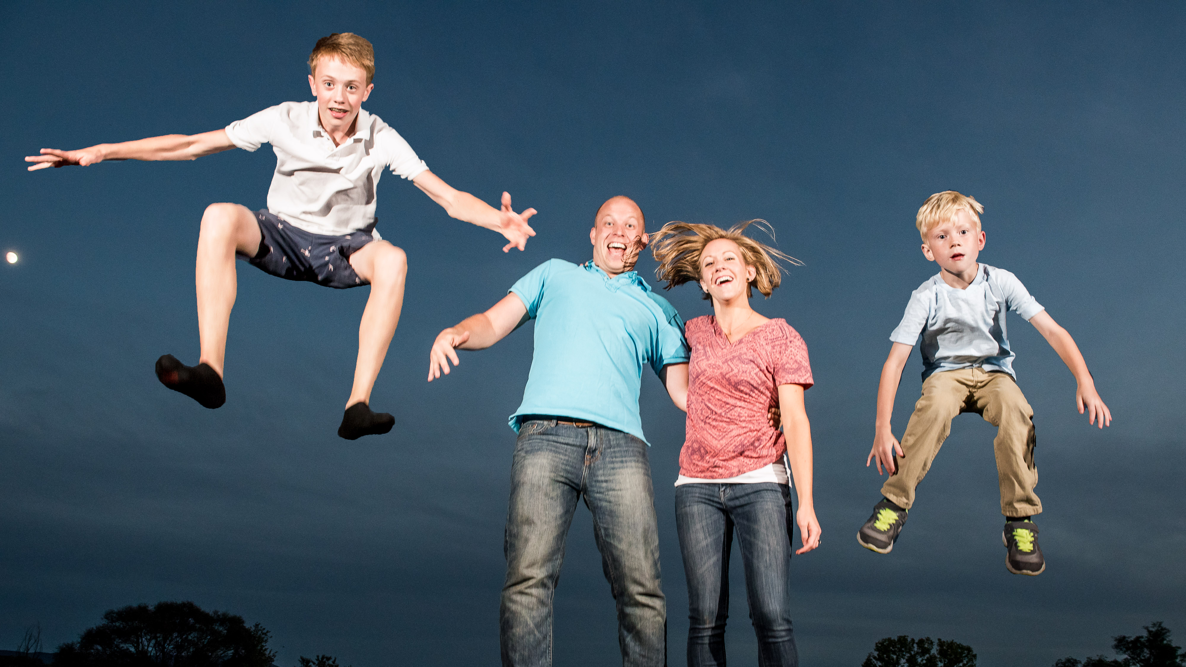 Fun family photos on trampoline
