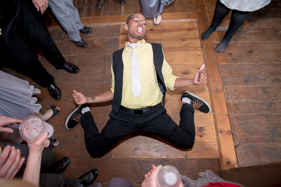 mustard-seed-gardens-wedding-photography-indiana-jen-tyler-17 awesome photo of wedding guest break dancing on dance floor at Noblesville, Indiana wedding
