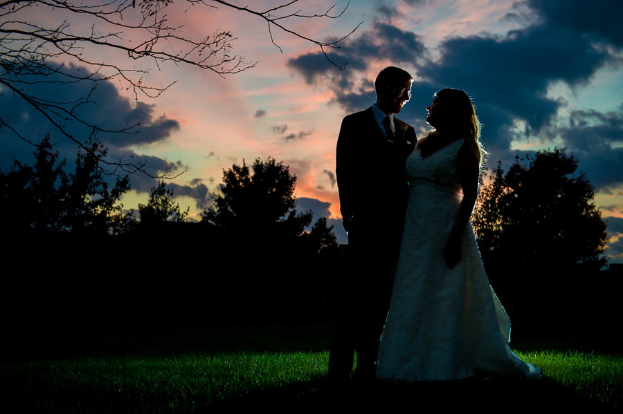 beautiful and romantic sunset portrait of bride and groom at Bloomington, Indiana wedding