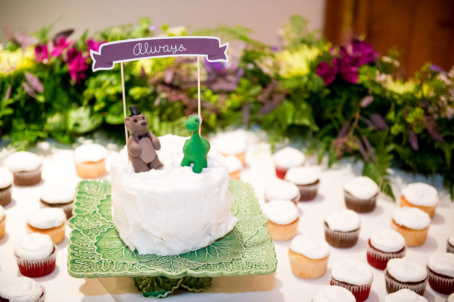 very cute, colorful, purple, green, cartoon-ish wedding cake