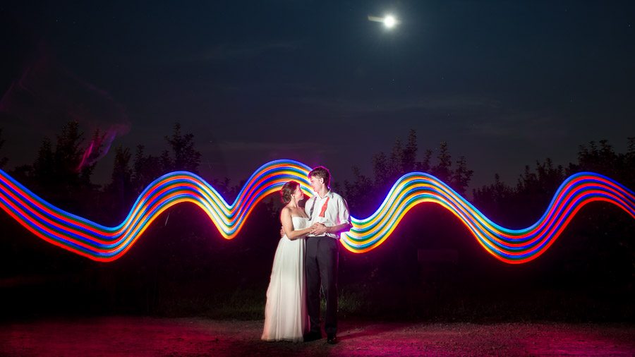 Bloomington-Indianapolis-Wedding-Photographers-2013-Favorite-Photos-of-the-Year-73 Fun, colorful light painting with bride and groom in orchard by TALL + small Photography